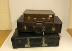 A Victor Luggage leather suitcase,