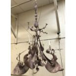 A wire base papier-mache and plaster framed modern abstract chandelier CONDITION REPORTS