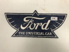 A modern painted cast metal sign "Ford The Universal Car" 37 cm wide