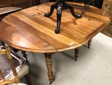 A pine and walnut D end dining table Size 158cm long x 72cm high x 128cm deep extended