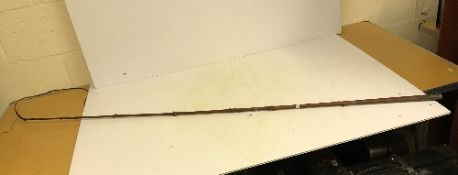 A vintage Swaine & Adeney of London wooden carriage whip with leather handle,