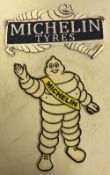 A modern painted cast metal sign "Michelin", 35 cm long and another "Michelin Tyres",
