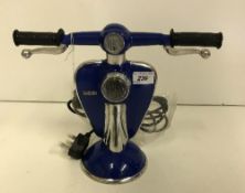 A "Lambretta" blue table lamp,