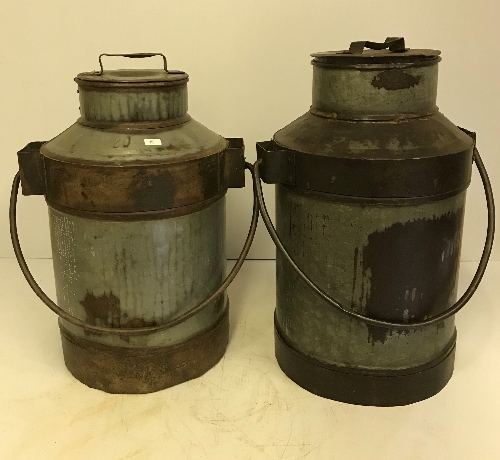 Two vintage style milk churns of different size,
