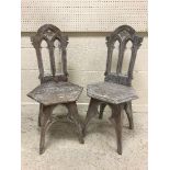 A pair of limed oak hall chairs in the Gothic Revival taste,