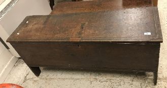 A 19th Century oak hutch, the single piece top over plain front and sides,