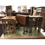 An Edwardian mahogany and inlaid drop-leaf Sutherland table and two oak nests of graduated