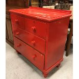 A Victorian painted pine chest of two short over two long drawers on turned feet,