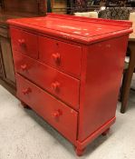 A Victorian painted pine chest of two short over two long drawers on turned feet,