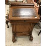 A Victorian oak Davenport desk,