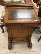 A Victorian oak Davenport desk,