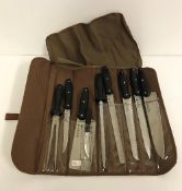 A Waltmann und Sohn 9 piece knife set in carry bag