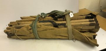 A pair of canvas and wooden folding Campaign camp beds