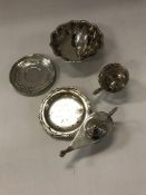 A collection of foreign white metal wares,