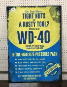 A reproduction rectangular metal sign, "WD-40",