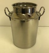 A stainless steel milk churn, 28.