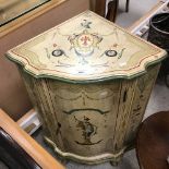 A 20th Century painted free-standing corner cupboard in the 19th Century Italian manner,