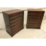 A pair of modern mahogany veneered chests of six drawers with brass beading in the Empire style,