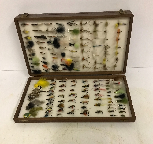 A Harrods mahogany double fly box containing approx 480 various flies 38 x 21.