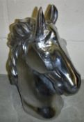 A polished aluminium horse head ornament 45cm high