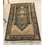 A silk mix prayer rug,
