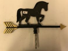 A black and gold painted cast iron "Horse" weather vane