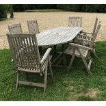 A set of six Royal Kensington teak slatted garden chairs and D end table 110 x 240 cm