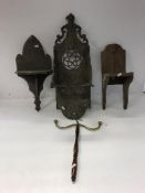 A box of sundry items to include various wooden wall brackets, two Victorian footstools,