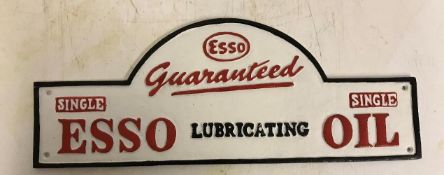A modern painted cast metal sign "Esso Lubricating Oil", 46.