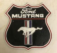 A modern painted cast metal sign "Ford Mustang",