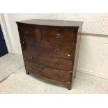 A late 19th Century mahogany bow fronted chest of two short over three long graduated drawers on
