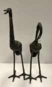 Two modern verdigris patinated bronze crane figures,