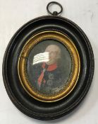 A 19th Century miniature of a decorated gentleman with red collar, sash and medals,
