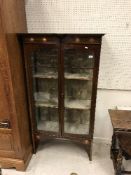 A circa 1900 mahogany china display cabinet with stylised foliate inlaid decoration in satinwood,