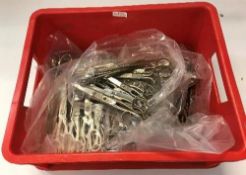 A large collection of various steel scissors and nail clippers