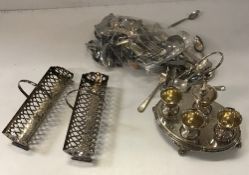 A box of assorted metal wares to include various plated cutlery, two biscuit baskets, teapot,