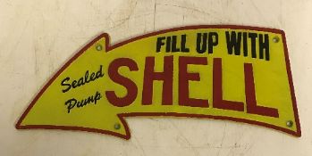 A modern painted cast metal sign "Fill Up with Shell",