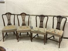 A collection of eight various 19th Century mahogany dining chairs with needlework upholstered seats,