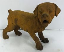A modern cast iron Puppy with rust effect finish,
