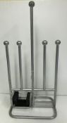 A modern metal boot rack / scraper,