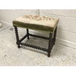 A 19th Century bobbin turned oak framed dressing stool in the 17th Century style with needlework