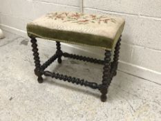 A 19th Century bobbin turned oak framed dressing stool in the 17th Century style with needlework