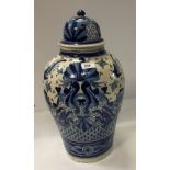 A 19th Century Delft lidded jar of baluster form,