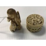 A 19th Century carved ivory lidded counter pot, the lid depicting figure in a landscape,