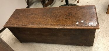 A 19th Century oak hutch, the single piece top over plain front and sides, 114.