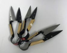 Three sets of traditional trimming shears