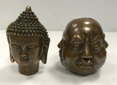 A modern bronze of a Sino Tibetan Buddha head and a bronze paperweight as a four-faced head.