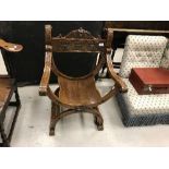 A Victorian carved walnut X frame chair in the 17th Century Continental manner,