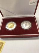 A cased set of two commemorative Beijing 2008 coins with certificates,
