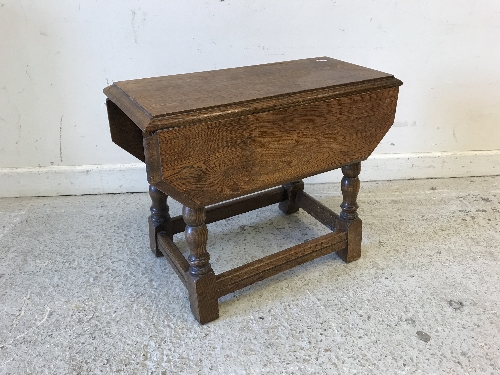 A reproduction burr walnut veneered silver table, the dished top over a fitted drawers, - Image 2 of 2